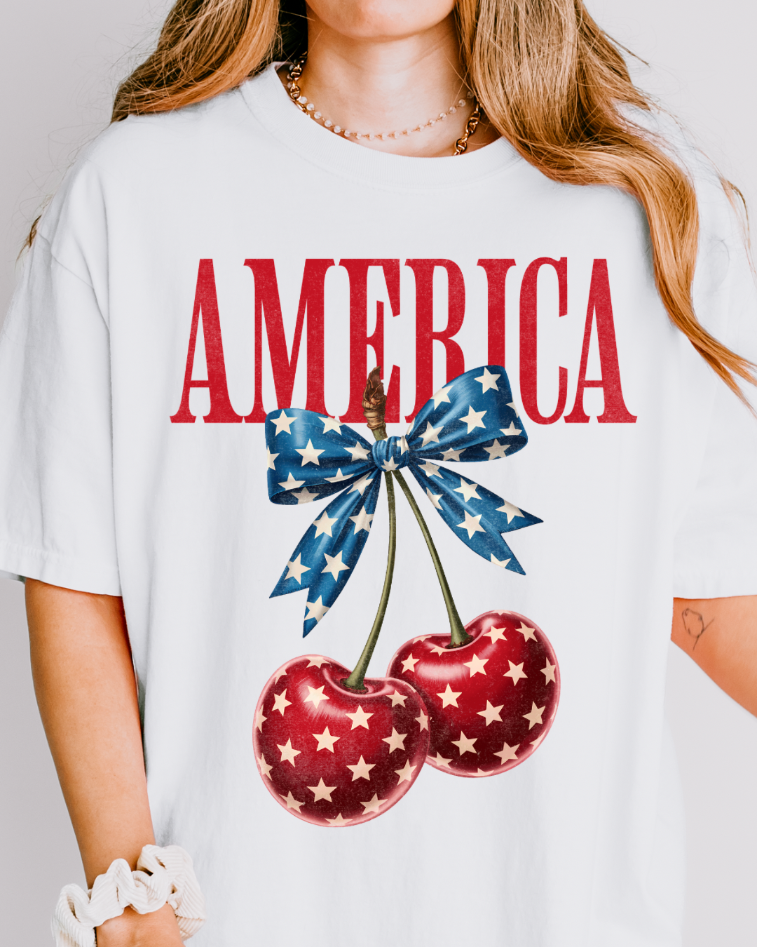 America Cherry Bow Graphic Tee – Patriotic Coquette Shirt